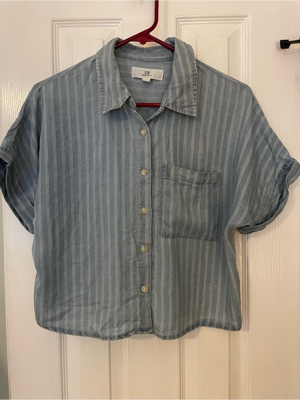 Blue and white button up short sleeve shirt